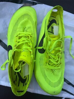 Nike Bright spikes, come with shoes bag
